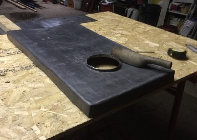 Custom building lead trays in Ridge Roofing yard