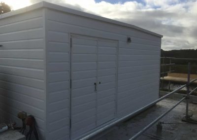 Water tank room completed, suing wood grain solid UPVC