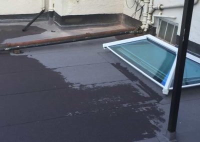 Laying the cap sheet