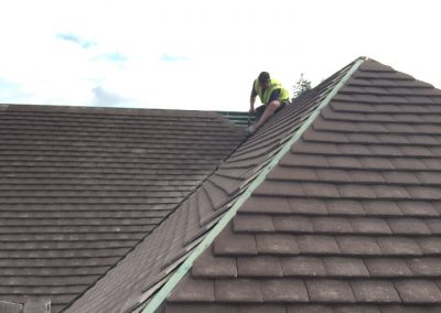 Cutting in the valley and hips on a plan tile job