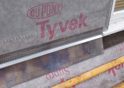 Installing lead flashing before plastering commences