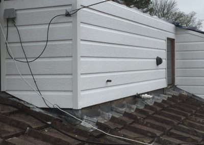 Using hollow vent under soffit board, boxing in old water tank holding bay